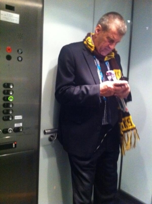JEFF KENNETT CHECKS FOR TEXTS FOLLOWING GEELONG'S AFTER THE SIREN WIN IN ROUND 19 2012