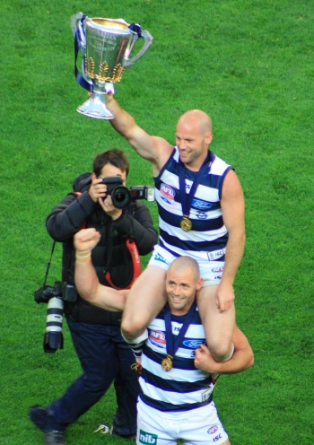 BALDIES JOSH HUNT AND PAUL CHAPMAN CELEBRATE THE 2011 PREMIERSHIP